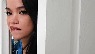 Stepmother Interacts with Stepson in Family Setting