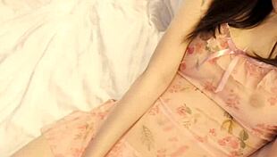 Pink micro mini one piece worn by cute asian brunette college student in teacher-student fetish scene with feet and legs focus