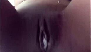 Petite woman dances alone in bedroom