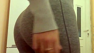 My stepsister masturbates in the kitchen in leggings and has an orgasm