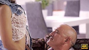 Student Enjoys Rough Fun with Older Bald Man