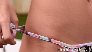 have you seen this wonderful female masturbating after stripping off her bikini?