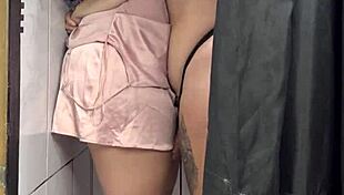 The big-assed woman with a giant cock enters the famous Rio store's dressing room and fucks the client intensely until she orgasms