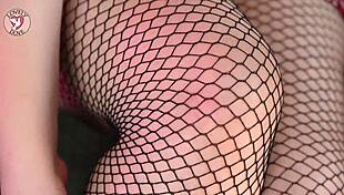 fishnets ripped open for deep thrusts into her tight shaved pussy lips