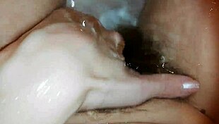 hairy pussy lips tease underwater in steamy pool bath closeup