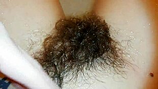 hairy pussy lips tease underwater in steamy pool bath closeup