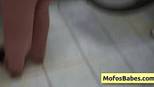 Sneaky teen brunette slurps wet cock in public laundry spin cycle