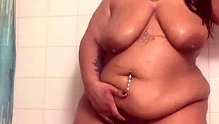 fresh faced slut bares ass and fucks pussy with dildo in steamy shower orgasm