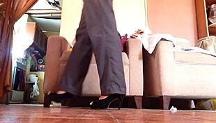 check out this sexy shemale strutting in her black high heels like a total tease