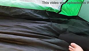 lesbian duo hides in rainy tent for wet pussy licks