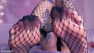 petite redhead goddess teases feet in fishnets for slave worship