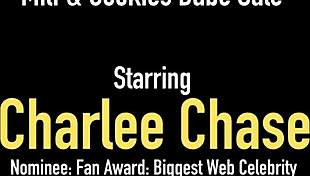 Cock-craving cougar Charlee Chase rides big tits strapon! 👅💦