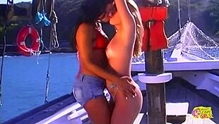 brunette bikini lesbians lick outdoors with toy