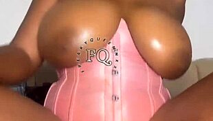 Ebony teen pounds huge rainbow dildo deep in pussy on bed