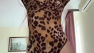 WATCH THIS CUTE BRUNETTE DANCE IN MINISKIRT REVEALING TINY TITS AND PUSSY!