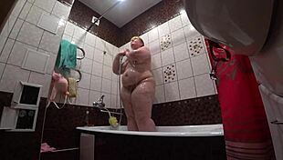 oh man spying on that fat russian milf's big ass shower feels wrong but hot